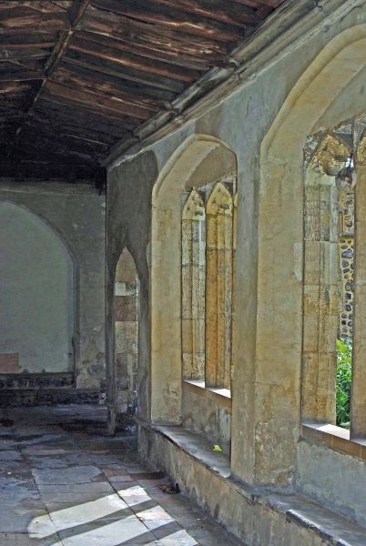 Image of the stone cloister  window and floor at the medieval Great Hospital Norwich
